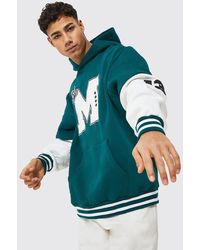 BoohooMAN - Oversized Faux Layer M Badge Hoodie - Lyst