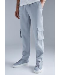 BoohooMAN - Elasticated Waist Tapered Fit Cargo Pleated Trouser - Lyst