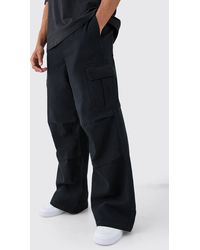 BoohooMAN - Extreme Baggy Fit Cargo Pants In Black - Lyst