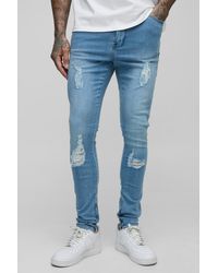 BoohooMAN - Tall Ripped Zip Hem Super Skinny Jeans - Lyst