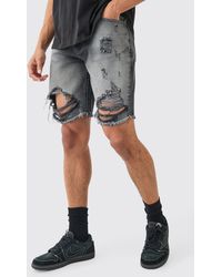 BoohooMAN - Relaxed Rigid Long Length Ripped Denim Shorts In Washed Black - Lyst