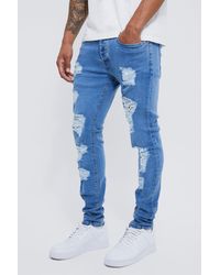 BoohooMAN - Skinny Stretch All Over Rip Jean - Lyst