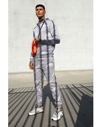 all over man printed hooded tracksuit black