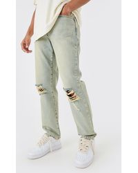 BoohooMAN - Relaxed Rigid Ripped Knee Jeans In Antique Blue - Lyst