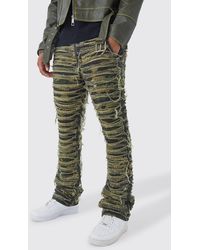 Boohoo - Slim Stacked Flare Heavily Distressed Camo Trouser - Lyst