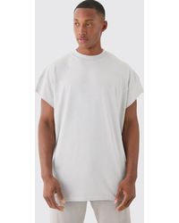 BoohooMAN - Oversized Wash Cut Off Sleeves T-shirt - Lyst