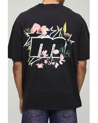 Boohoo - Camiseta Oversize Negra Desteñida Con Estampado De Flores Y Estrellas - Lyst