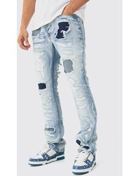 Boohoo - Slim Rigid Flare Stacked Rip & Repair Jeans In Ice Blue - Lyst