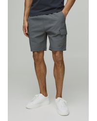 BoohooMAN - Elasticated Waist Relaxed Mid Length Seersucker Cargo Shorts - Lyst