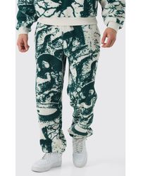 BoohooMAN - Oversized Borg Gothic Print Cuffed Jogger - Lyst