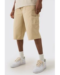 BoohooMAN - Tall Elastic Waist Stone Relaxed Fit Longer Length Cargo Shorts - Lyst
