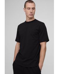Boohoo - Camiseta Con Cuello De Caja Y Bordado De Firma Bm - Lyst