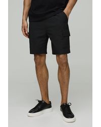 BoohooMAN - Elasticated Waist Relaxed Mid Length Seersucker Cargo Shorts - Lyst