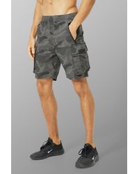 Mens Clothing Shorts Cargo shorts for Men BoohooMAN Plus Man Spliced Zipped Pocket Cargo Short in Chocolate Brown 