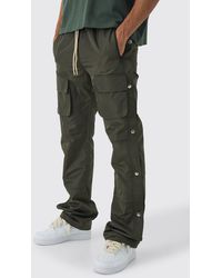 BoohooMAN - Elasticated Waist Slim Flare Stacked Cargo Pants - Lyst