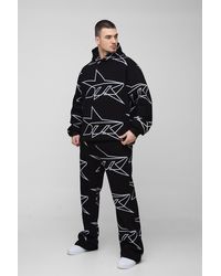 BoohooMAN - Tall Oversized Star All Over Printed Gusset Flare Hooded Tracksuit - Lyst