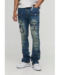 BoohooMAN - Skinny Stacked Multi Cargo Pocket Flared Jeans - Lyst