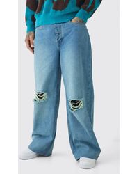 BoohooMAN - Tall Baggy Fit Distressed Jeans - Lyst