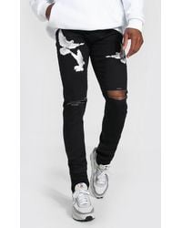 BoohooMAN Skinny Stretch Stacked Dove Print Jeans - Black