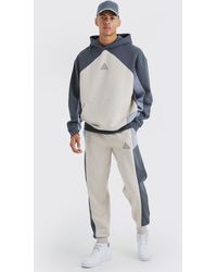 BoohooMAN - Oversized Branded Colour Block Hooded Tracksuit - Lyst