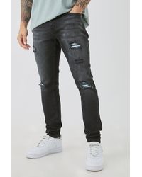 BoohooMAN - Skinny Stretch Ripped Bandana Jeans In Washed Black - Lyst
