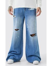 BoohooMAN - Tall Extreme Baggy Frayed Self Fabric Applique Jeans - Lyst