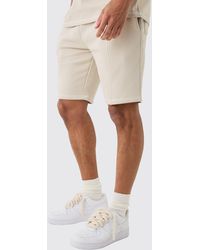 BoohooMAN - Loose Contrast Stitch Embroided Shorts - Lyst
