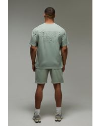 BoohooMAN - Training Dept Oversized Embossed T-Shirt & Short Set - Lyst