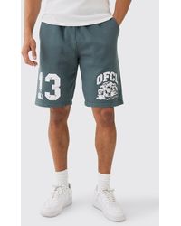 BoohooMAN - Relaxed Mid Length Ofcl Racing Acid Wash Shorts - Lyst