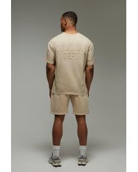 BoohooMAN - Training Dept Oversized Embossed T-Shirt & Short Set - Lyst