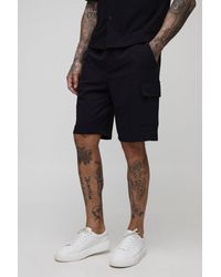 BoohooMAN - Tall Relaxed Fit Technical Stretch Cargo Shorts - Lyst