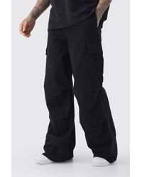 BoohooMAN - Tall Extreme Baggy Fit Cargo Trousers In Black - Lyst
