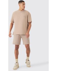 BoohooMAN - Oversized Extended Neck Official Embossed T-shirt And Relaxed Short Set - Lyst