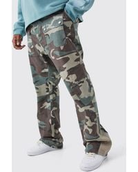 Boohoo - Plus Slim Stacked Gusset Flare Multi Cargo Camo Trouser - Lyst