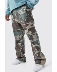BoohooMAN - Plus Slim Stacked Gusset Flare Multi Cargo Camo Trouser - Lyst