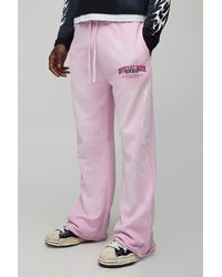 BoohooMAN - Relaxed Fit Flared Glitter Print Spray Wash Graphic Gusset Joggers - Lyst