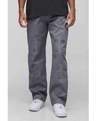 BoohooMAN - Tall lockere Hose mit Kreuz-Applikation - Lyst