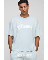 BoohooMAN - Kastiges blaues Oversize T-Shirt mit M Stern-Print - Lyst