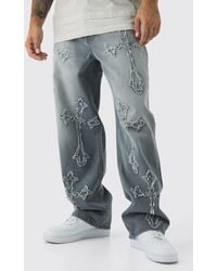 BoohooMAN - Baggy Rigid Washed Cross Applique Jeans - Lyst