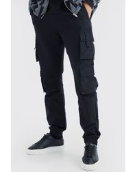 BoohooMAN - Tall Slim-Fit Jogginghose mit Cargo-Taschen und elastischem Bund - Lyst