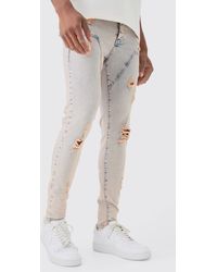 Boohoo - Skinny Stretch Ripped Carpenter Jeans In Pink Tint - Lyst