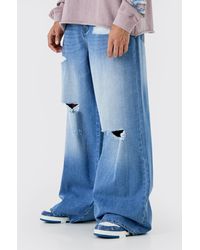 BoohooMAN - Extreme Baggy Frayed Self Fabric Applique Jeans - Lyst
