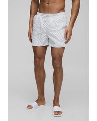 BoohooMAN - Kurze Badehose mit abstraktem Print - Lyst