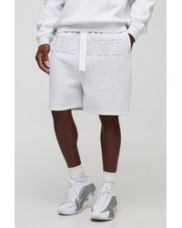 BoohooMAN - Oversized Worldwide Embossed Drop Crotch Shorts - Lyst