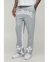 BoohooMAN - Tall Schlag-Jogginghose mit Worldwide Kreuz-Print - Lyst