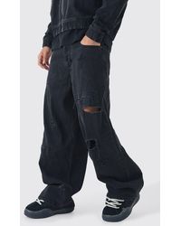 BoohooMAN - Lockere Jeans mit Kreuz-Applikation - Lyst