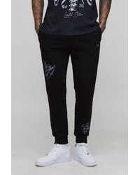 BoohooMAN - Tall Regular Fit Cherub Worldwide Print Jogger - Lyst