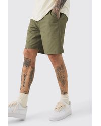 BoohooMAN - Tall Fixed Waist Khaki Relaxed Fit Short Shorts - Lyst