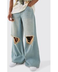 Boohoo - Extreme Baggy Rigid Exploded Knee Rip Denim Jean In Light Blue - Lyst