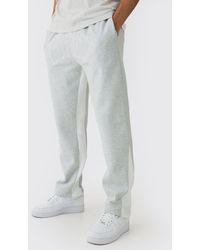 BoohooMAN - Regular Fit Worldwide Embroidered Contrast Stitch Gusset Sweatpants - Lyst